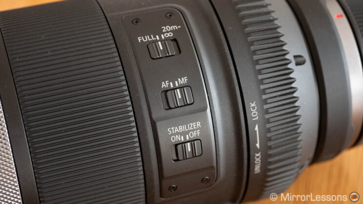 close-up on the three switches of the Canon 600mm F11