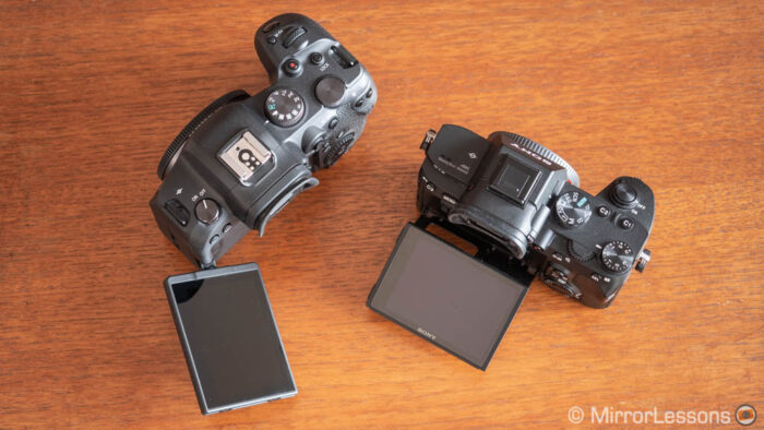 Canon EOS R6 and Sony A7 3 view from the top with their LCD tilted and oriented out