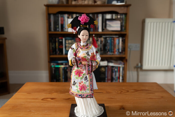 Japanese doll on a table in a living room