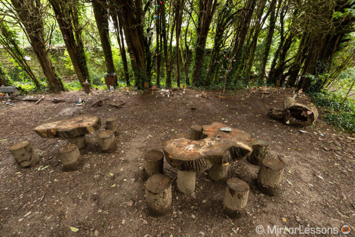 Small wooden tables in the woods